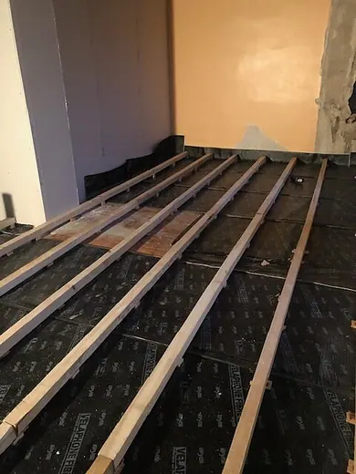 Préparation avant pose parquet collé sur OSB — photo 3